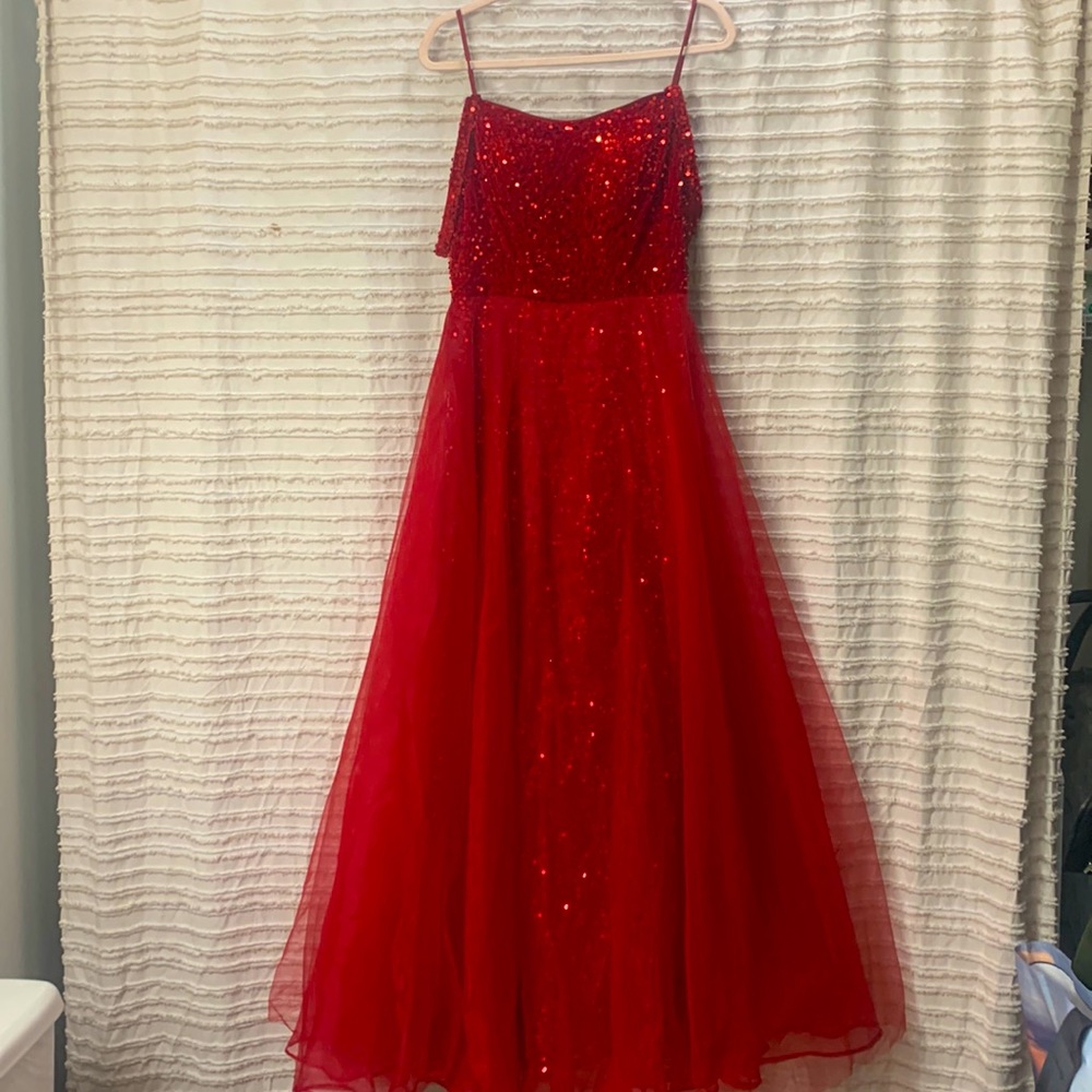 Never worn ruby red prom dress with a lace up back.